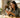 Woman examining PureBulk supplement bottle at kitchen table